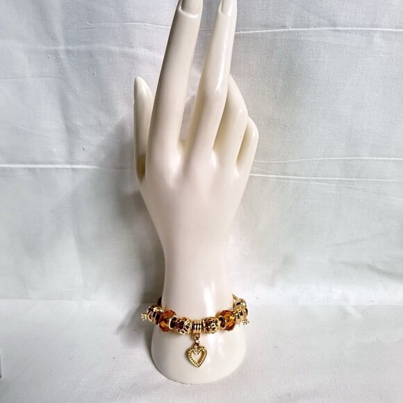 Gold-Tone Slide Charm Bracelet with Amber Crystal & Heart Charms - Picture 7 of 8